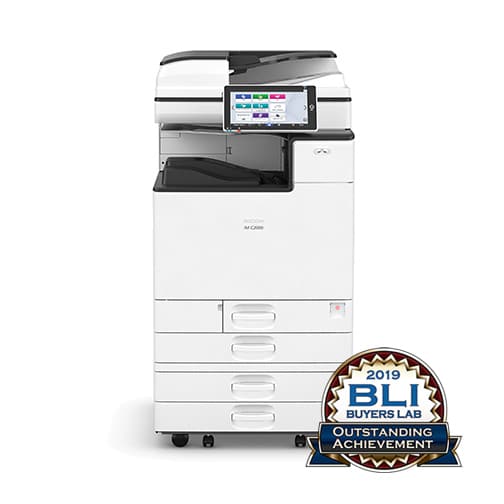Ricoh IM C6000 multifunctionele printer in een kantooromgeving